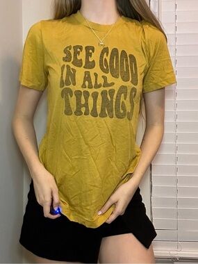 “See good in all things” yellow graphic tee